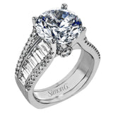 Crafted from 18k white gold, this modern engagement ring commands attention with 1.48 cttw of Baguette diamonds in combination with .39 cttw of round diamonds.