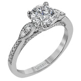 This absolutely charming white gold ring features a subtle, nature-inspired design as well as .32 ctw of round white diamonds.