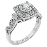This dazzling, vintage-inspired white gold ring balances organic and geometric shapes with the help of .28 ctw of round white diamond accents.