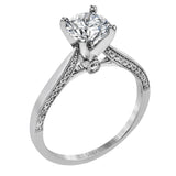 This absolutely stunning white gold engagement ring features a sleek design with .21 ctw of round white diamonds for a touch of glamour.