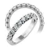 This band pairs perfectly with an engagement ring, or can be worn on its own or stacked with other rings. It contains 1.00 ctw of white diamonds.