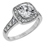 This exquisite white gold ring features a square halo and milgrain detail along with .49 ctw of round white diamond accents.