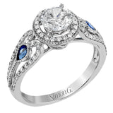 This intricate vintage-inspired engagement ring has two accent sapphire side stone totaling .25 ctw, while .33 ctw of white diamonds sparkle on the rest of the setting.