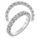 This classic wedding band features a distinctive setting style that shows off the 1.00 ctw of white diamonds to their full advantage.