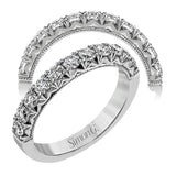 This classic wedding band features a distinctive setting style that shows off the .75 ctw of white diamonds to their full advantage.