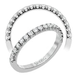 This classic wedding band features a distinctive setting style that shows off the .35 ctw of white diamonds to their full advantage.