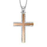 This two-tone 18k gold cross pendant is has a central design of rose gold which is edged by .24 ctw of scintillating white round brilliant diamonds.