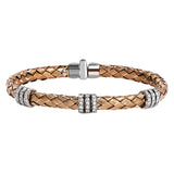 Carefully woven from 18k rose gold, this remarkable bangle bracelet is perfect for everyday wear as well as formal occasions with .72 ctw of white diamonds. Perfect for stacking.