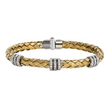 With a 18k yellow gold woven design, this bracelet is truly stunning with .73 ctw of shining white round brilliant diamonds. Perfect for stacking.