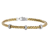 This wonderful 18k yellow gold woven bracelet contains .33 ctw of white diamonds, adding an opulent touch which can still be worn everyday. Perfect for stacking.