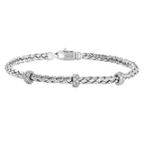 This woven 18k white gold bracelet is ideal for layering, but can also stand on its own. A total of .33 ctw of white diamonds add sparkle to this piece. Perfect for stacking.