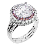 This 18k white and rose gold engagement ring is sure to turn heads with 1.09 ctw of white diamonds as well as .12 ctw of pink diamonds.