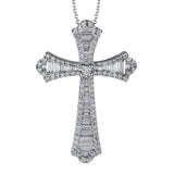 This striking white gold cross pendant is accented by the presence of .40 ctw round white diamonds and .56 ctw baguette cut diamonds.