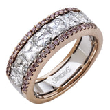This gorgeous white and rose gold band is accentuated by .24 ctw of round cut white diamonds and 1.70 ctw of Asscher cut diamonds.