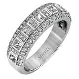 These stunning 18k white gold band contains .93 ctw of princess cut white diamonds as well as .44 ctw of round white diamonds.