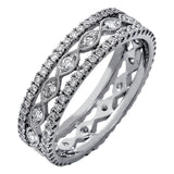 This wonderful 18k gold band features .87 ctw of white diamonds set into an intricate, three layer design.  It can be worn on its own as a fashion statement or function as a wedding band.