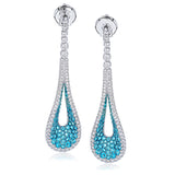 Featuring a distinctive open teardrop design, this elegant white gold earrings are highlighted by 1.62 ctw of white diamonds and 1.57 paraiba blue tourmalines accents.