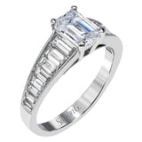Reflecting a dazzling contemporary design, this incredible white gold ring is set with 1.11 ctw of shimmering baguette cut diamonds.