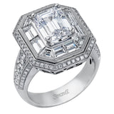 This gorgeous white gold contemporary engagement features an arresting 1.65 ctw of mosaic diamonds accentuated by .80 ctw of princess cut white diamonds.