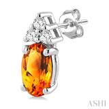 1/20 Ctw Oval Cut 5X3 MM Citrine and Round Cut Diamond semi-precious Earrings in 10K White Gold