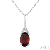 1/50 Ctw Oval Cut 6X4 MM Garnet and Round Cut Diamond Semi-Precious Pendant With Chain in 10K White Gold