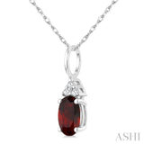 1/50 Ctw Oval Cut 6X4 MM Garnet and Round Cut Diamond Semi-Precious Pendant With Chain in 10K White Gold
