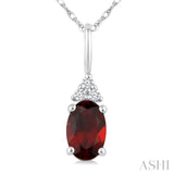 1/50 Ctw Oval Cut 6X4 MM Garnet and Round Cut Diamond Semi-Precious Pendant With Chain in 10K White Gold