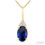 1/50 Ctw Oval Cut 6X4 MM Sapphire and Round Cut Diamond Precious Pendant With Chain in 10K Yellow Gold