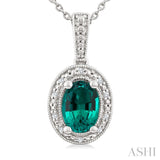 7X5 MM Oval Shape Lab-Created Emerald and 1/50 Ctw Round Cut Diamond Precious Pendant With Chain in Sterling Silver