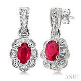 5x3 MM Oval Cut Ruby and 1/20 Ctw Round Cut Diamond Earrings in Sterling Silver