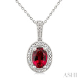 7X5 MM Oval Shape Lab-Created Ruby and 1/50 Ctw Round Cut Diamond Precious Pendant With Chain in Sterling Silver