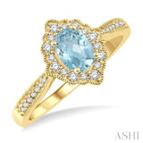 6x4 MM Oval Shape Aquamarine and 1/5 Ctw Round Cut Diamond Semi-Precious Ring in 10K Yellow Gold