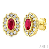 5X3 MM Oval Shape Ruby and 1/5 Ctw Round Cut Diamond Bold Precious Earrings in 10K Yellow Gold