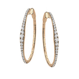 A fresh take on the diamond hoops in 18K rose gold 1.11 ctw, they taper at the ends and feature larger diamonds in the center graduating to small towards the ends.