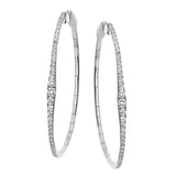These modern oval shaped hoops in 18K white gold are perfect for everyday wear, and feature 1.18 ctw of white diamonds