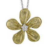 18K two tone gold textured flower pendant has a cluster of white diamonds in it's center 0.04 ctw on a white gold chain