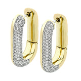 An every day classic, these 18K white and yellow gold earrings feature .79cttw diamonds.