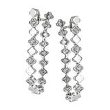 These versatile earrings can be worn in two ways, transforming from a line of diamonds into soft hoops. They're perfect for going from day to night.
