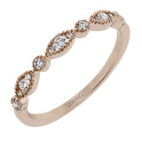 This ring is perfect for stacking with a distinctive design set with  .20 ctw of diamonds.