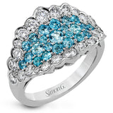 A stunning statement, this right hand ring features .87cttw pariba tourmaline surrounded by 1.35cttw diamonds.