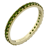 This simple 18k band adds a perfect touch of color with .38 ctw of emeralds.