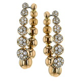 .50 ctw of white diamonds sparkle against beautiful rose gold droplets in these elegant, unique earrings