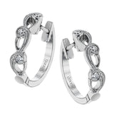These beautiful white gold earrings feature an intricate scrolling design with .11 ctw of round white diamonds for just a hint of sparkle.
