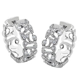 These traditional white gold hoop earrings reflect a romantic floral openwork design accented with .37 ctw of shimmering white diamonds.