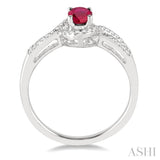6x4 MM Oval Cut Ruby and 1/6 Ctw Round Cut Diamond Ring in 14K White Gold