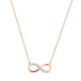 Rose gold finish sterling silver micropave infinity necklace with simulated diamonds on 16 to 18 adjustable cable chain.