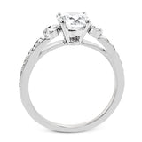 This Roxy Collection engagement ring takes inspiration from the past but updates it into a perfect design featuring .40 ctw of white side diamonds.