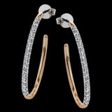 These beautiful earrings feature .75 ctw of white diamonds set in 18K rose gold.