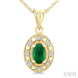5x3 MM Oval Shape Emerald and 1/20 Ctw Round Cut Diamond Pendant in 14K Yellow Gold with Chain