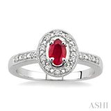 5x3 MM Oval Cut Ruby and 1/10 ctw Single Cut Diamond Ring in 10K White Gold.